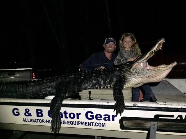 Corey 2nd gator with daughter
